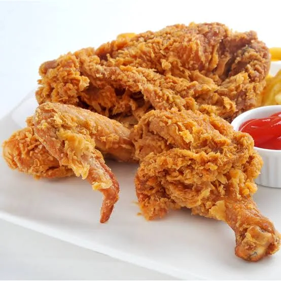 Golden crispy Chicken Broast pieces served with fries, garlic mayo, ketchup and lemon wedges